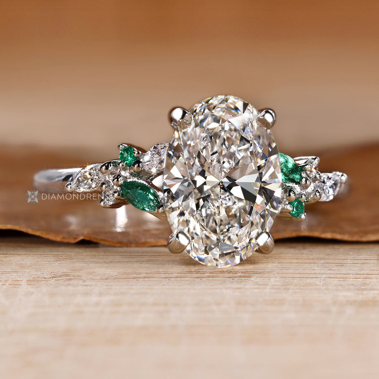 Oval engagement ring with a four prong setting.