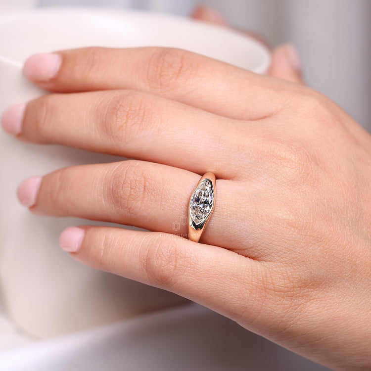Marquise Cut Engagement Ring in Gypsy Setting