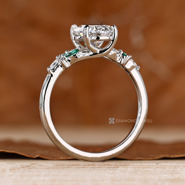 Lab grown diamond engagement ring with a cluster setting.