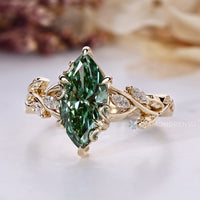 Lab grown diamond with marquise side stones.