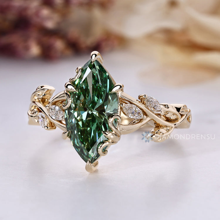 Lab grown diamond with marquise side stones.