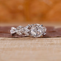 Vintage inspired lab diamond ring with a round cut twisted pave band.
