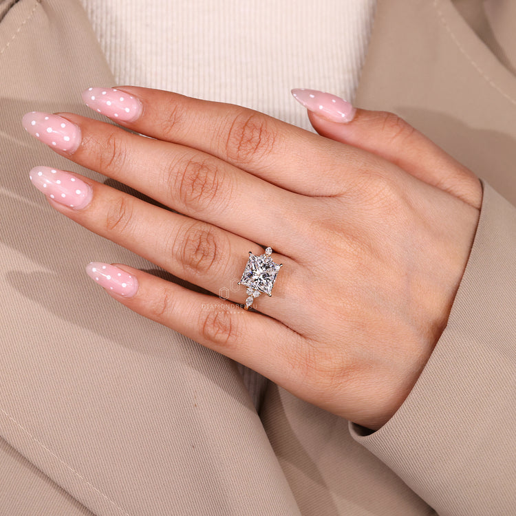 Seven stone princess cut lab grown diamond engagement ring.
