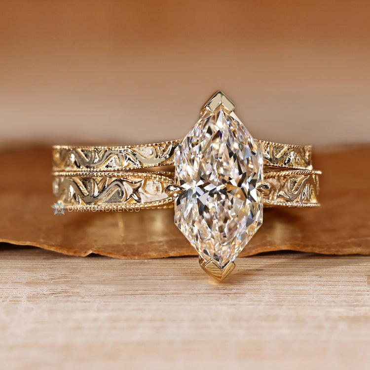 Dutch marquise bridal set with a curvy band.