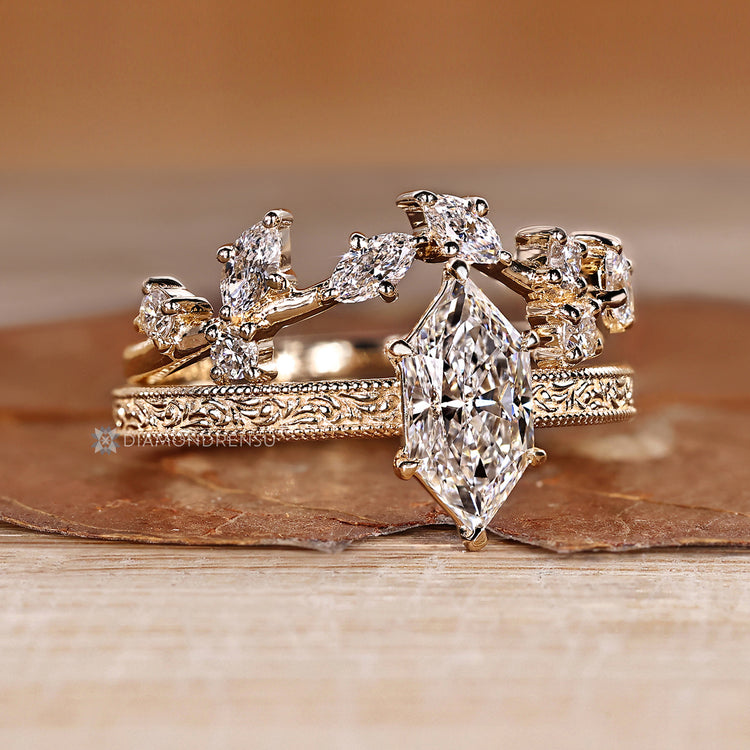 Dutch Marquise ring with curvy band and milgrain.