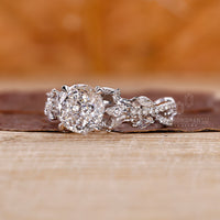 IGI certified lab grown diamond ring with marquise and round side stones.