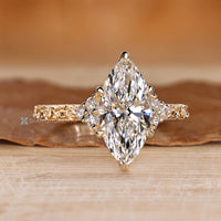 Tulip setting paired with cathedral setting and six claw prong setting.