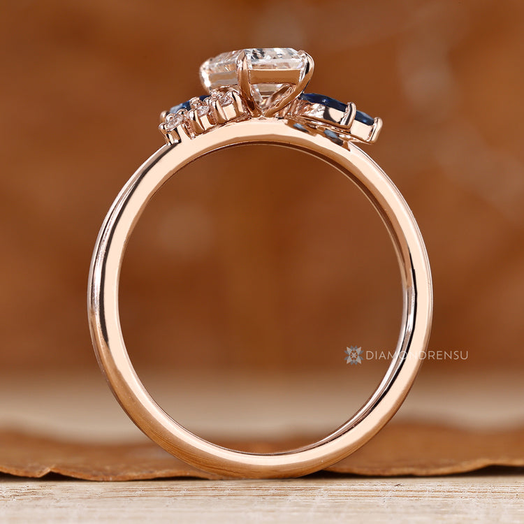 Diamondrensu handmade asymmetrical cluster ring with round side stones.