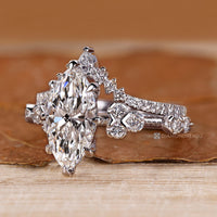 Muse setting highlights the marquise center stone.