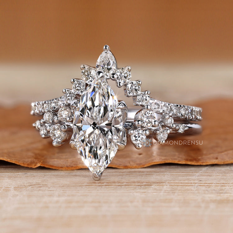 Lab grown diamond marquise ring with six claw prongs.