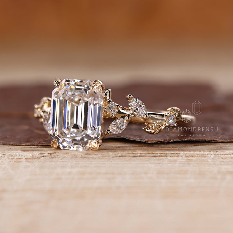 Handmade nature inspired ring with emerald old european cut diamond design.
