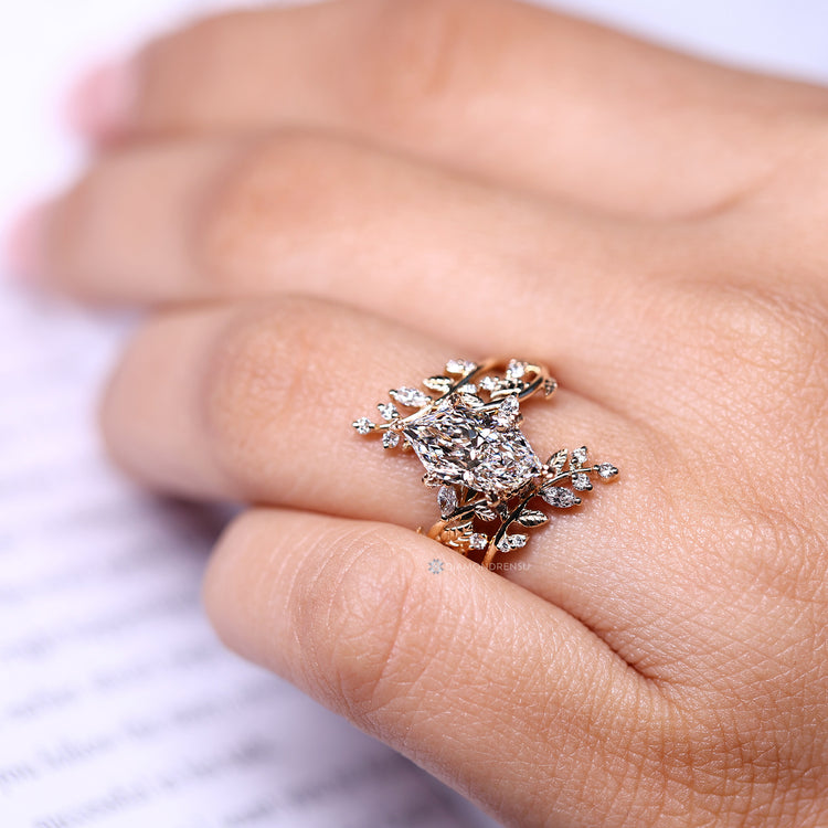 Nature inspired ring with six leaf prong setting.