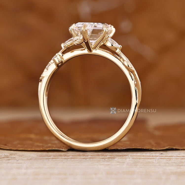 Handmade hexagon ring with cathedral setting and leaf style prongs.