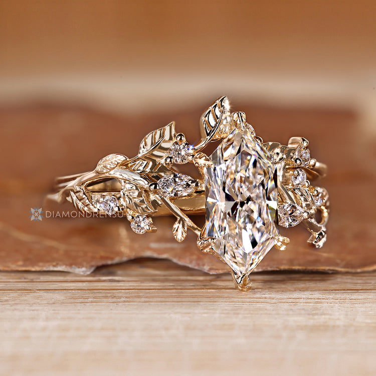 Marquise and round diamond wedding ring with leaf prongs
