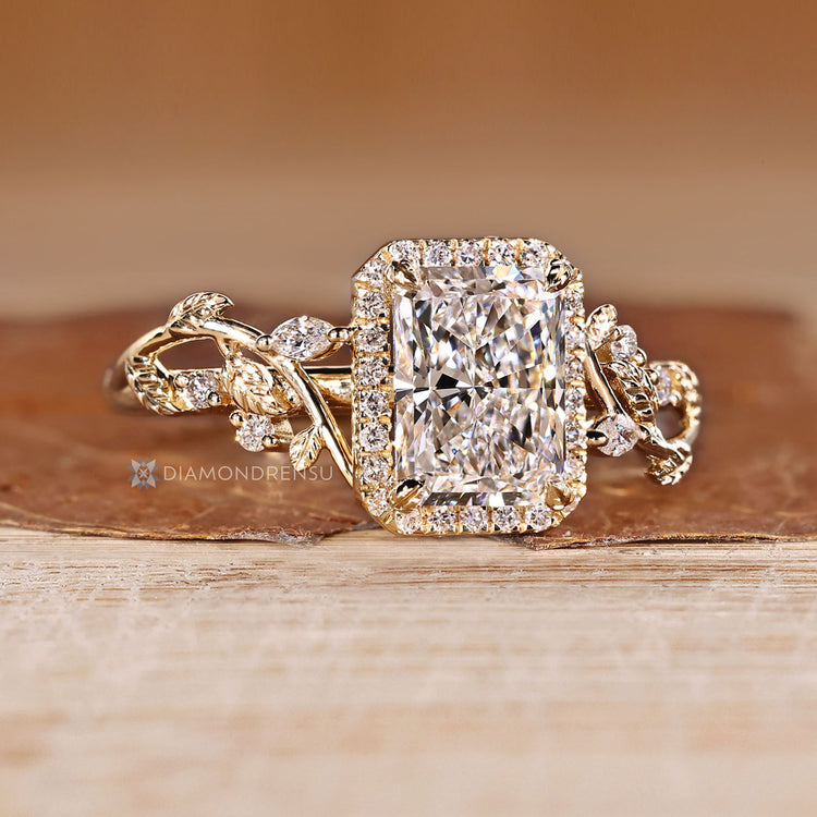 IGI certified radiant cut diamond ring with leaf style prong setting.