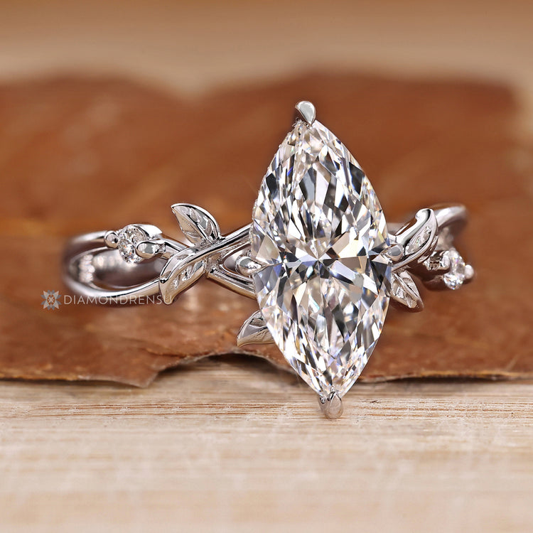 Handmade nature inspired ring with four claw prong setting.