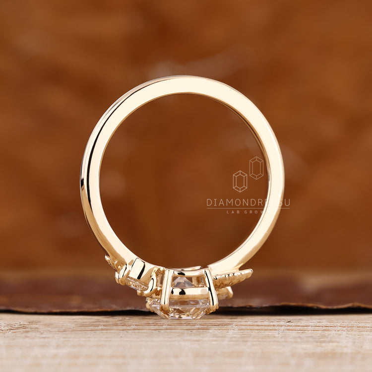 Round old European cut diamond three stone engagement ring.
