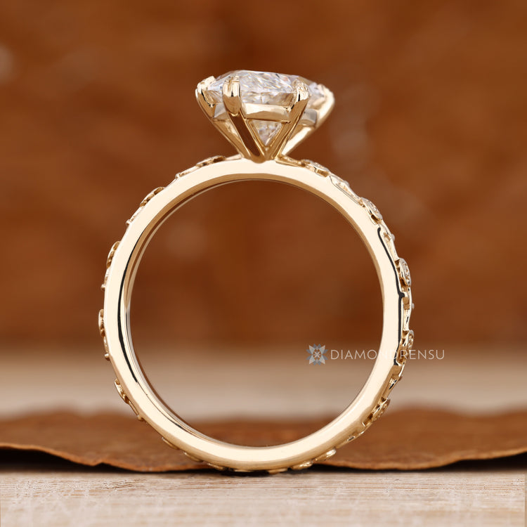 IGI certified marquise lab grown diamond engagement ring.