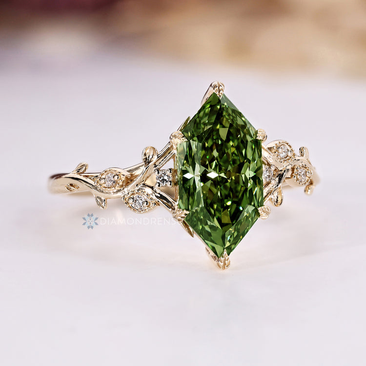 Nature inspired diamond ring with round side stones.