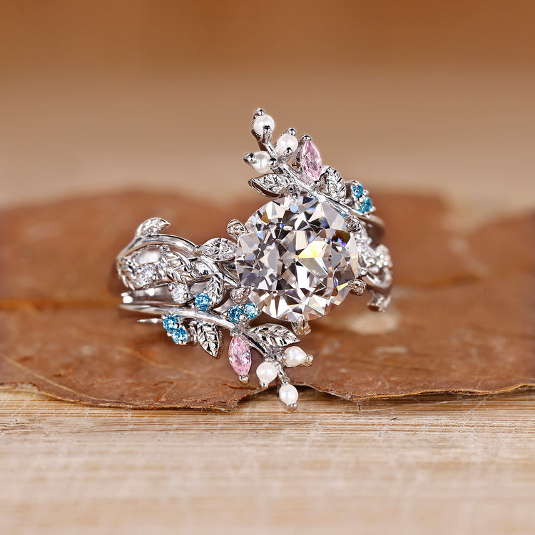Pink marquise diamond band in a custom engagement ring.