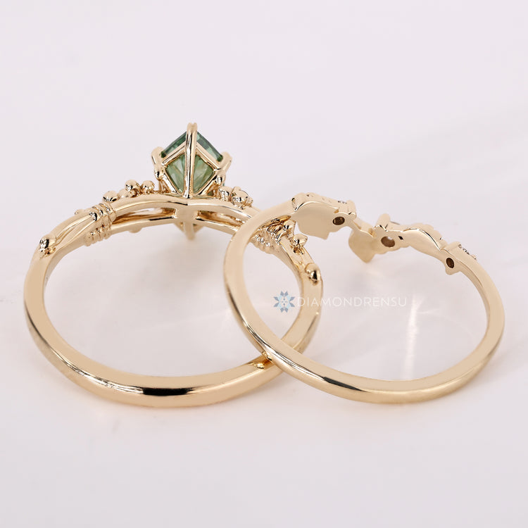 Green Dutch marquise bridal set with a curvy design.
