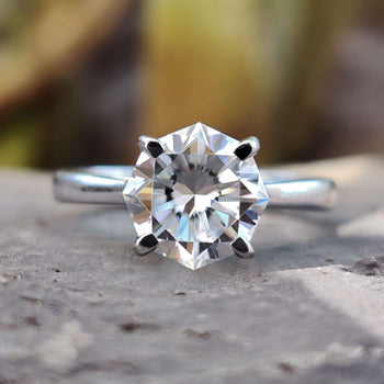 Octagon engagement ring featuring a bold geometric design with Hidden Infinity details.
