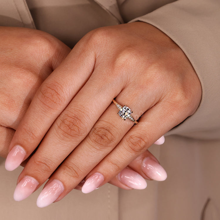 Cushion OMC Diamond Engagement Ring With Round Side Diamonds.
