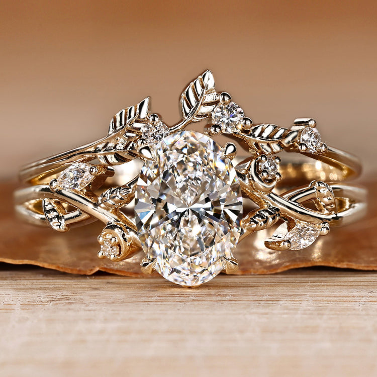Oval bridal set with round and marquise side stones.