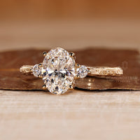 IGI certified three diamond ring with detailed engraved shank.
