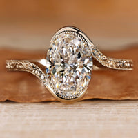 Art Deco diamond ring with an oval cut.