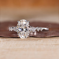 IGI certified oval cut diamond ring with lab grown diamonds.