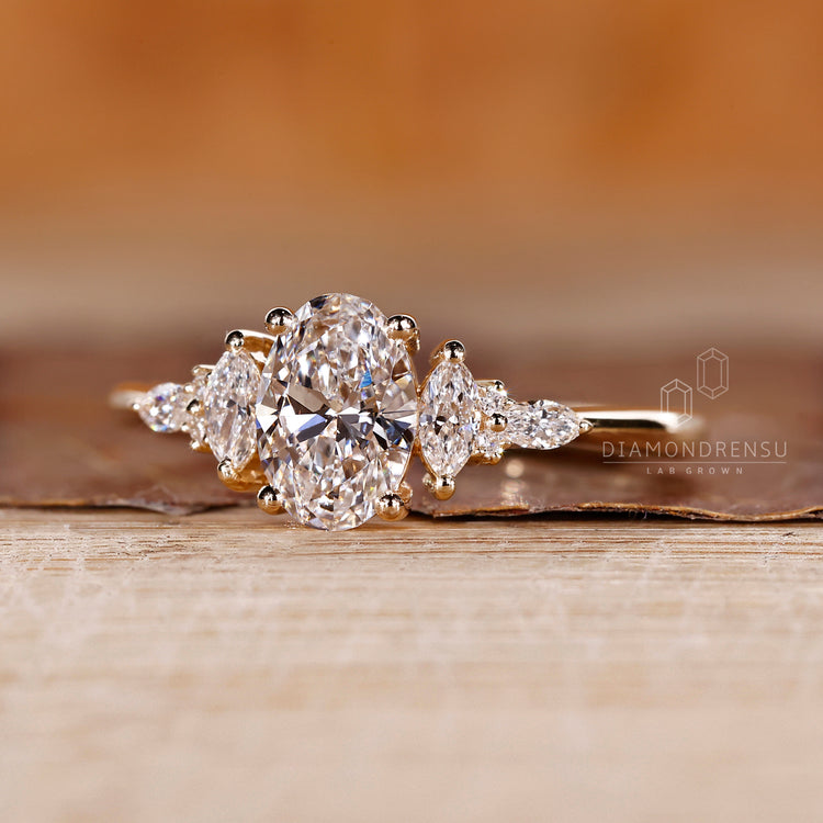 Lab grown oval diamond ring with unique muse setting.