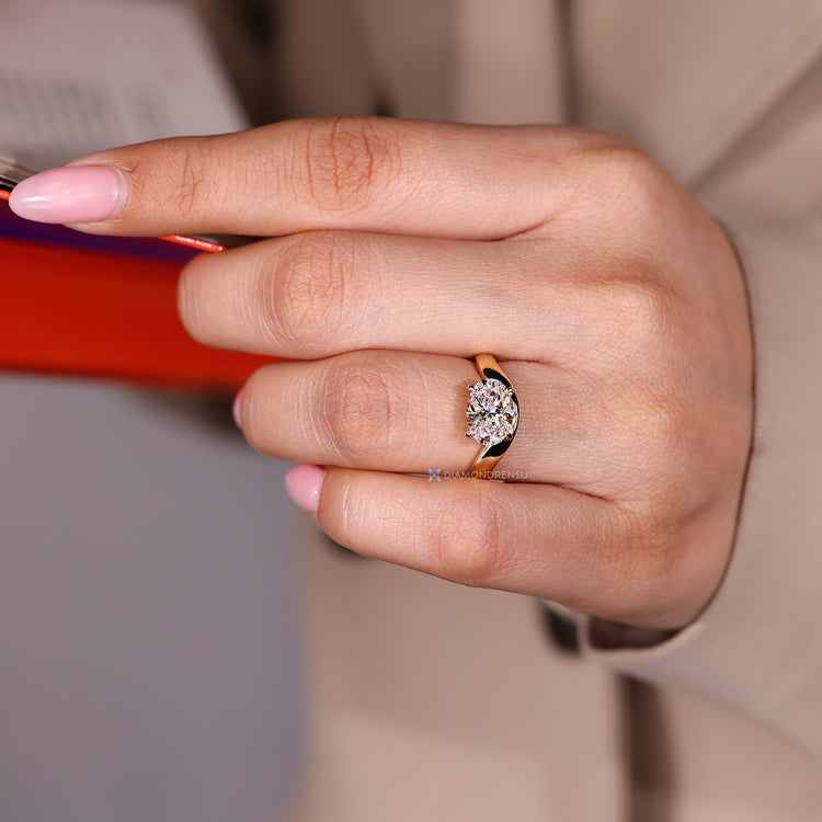 Handmade oval engagement ring with four claw prong setting.