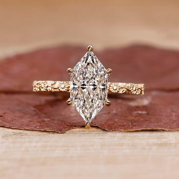 Art deco engagement ring featuring a Dutch marquise diamond, designed with vintage-inspired details.
