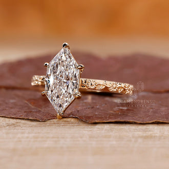 Buy lab-grown ring with a marquise diamond, offering a sustainable and affordable alternative.
