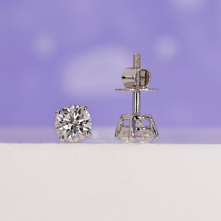 Sleek diamond stud earrings designed for versatile style.
