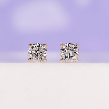 Elegant yellow gold diamond earrings for timeless style.
