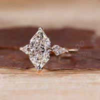 Dutch Marquise Engagement Ring with 2 Kite Cut Side Stone