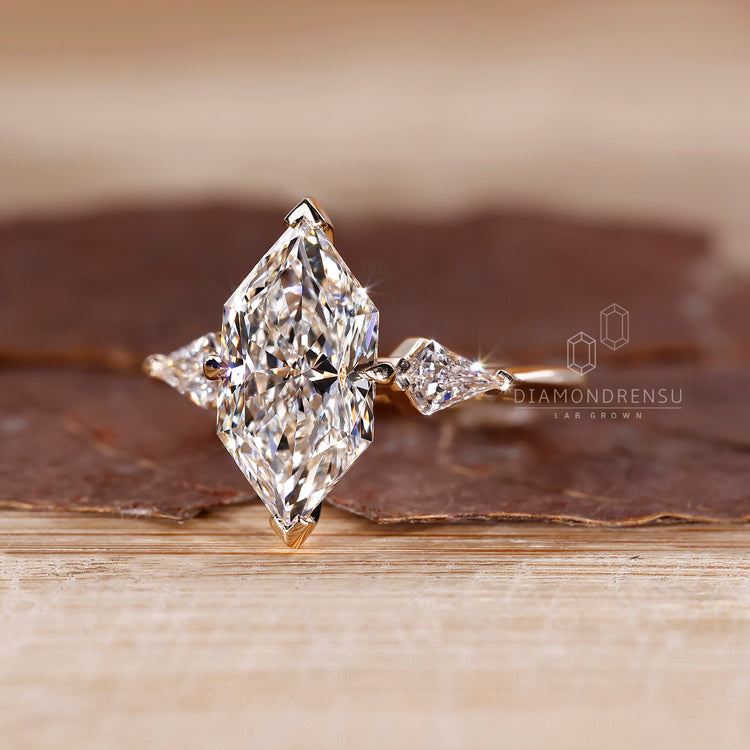 Dutch Marquise Engagement Ring with 2 Kite Cut Side Stone