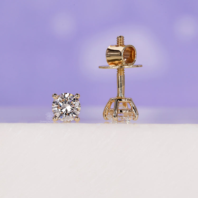 Sparkling round cut diamond earrings for every occasion.

