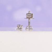 Premium gold stud earrings featuring a sleek and modern design.
