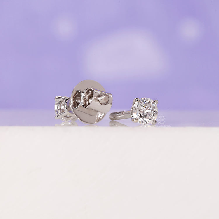 Luxurious handmade jewelry featuring diamond stud earrings for women.
