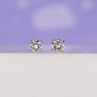 Elegant white gold earrings 0.18 TCW for a timeless look.
