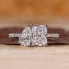 Toi Et Moi engagement ring with pear and radiant diamonds, offering a unique design.
