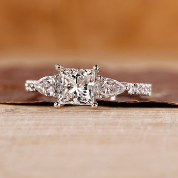 Cathedral Setting Engagement Ring crafted with princess cut diamond ring in white gold ring.

