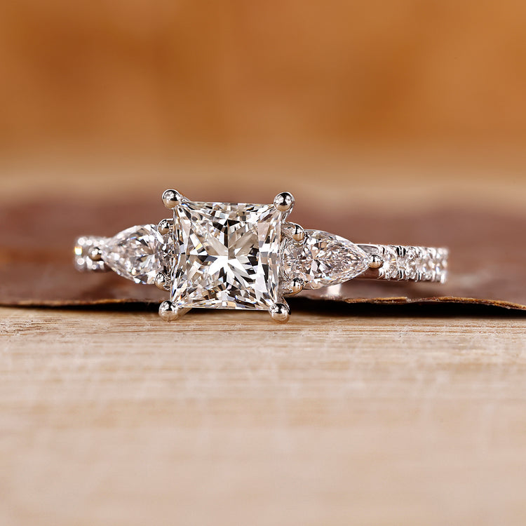 Cathedral Setting Engagement Ring crafted with princess cut diamond ring in white gold ring.
