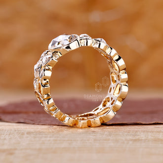 Cluster engagement ring with intricate diamond arrangement.
