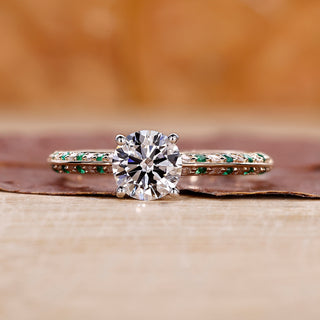 Two Tone Diamond Ring featuring a round cut diamond in a four prong ring setting.
