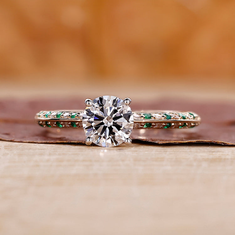 Two Tone Diamond Ring featuring a round cut diamond in a four prong ring setting.
