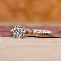 Green Diamond Ring with a round cut diamond in a four prong setting for secure hold.
